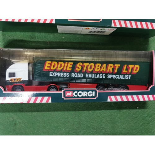 124 - Collection of 2x boxed Eddie Stobart curtain side trucks, both are Express road haulage. One Volvo a... 