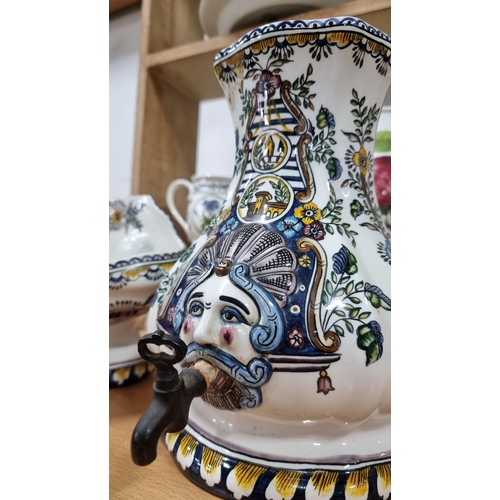 211 - Portuguese hand painted ceramic wall hanging basin & jug. Basin has a crack to the back. Height of j... 