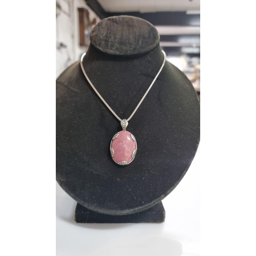 253 - Good 925 Silver Art Nouveau style pendant inset with a large oval Rhodochrosite semi precious stone,... 