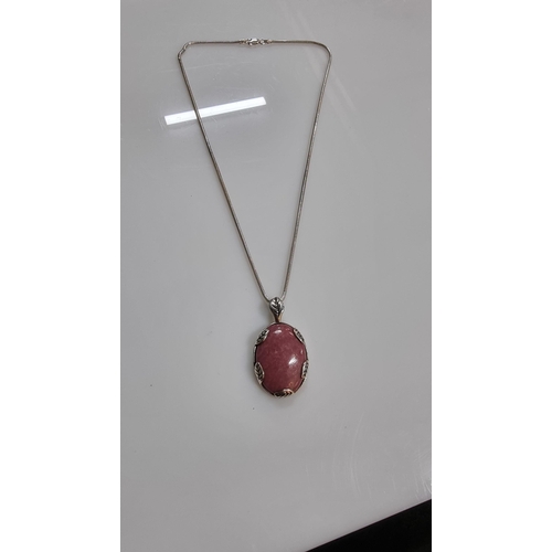 253 - Good 925 Silver Art Nouveau style pendant inset with a large oval Rhodochrosite semi precious stone,... 