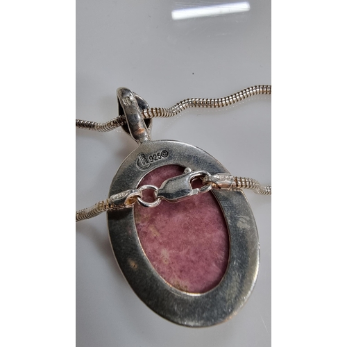 253 - Good 925 Silver Art Nouveau style pendant inset with a large oval Rhodochrosite semi precious stone,... 