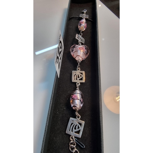 259 - 925 Silver Charles Rennie Mackintosh bracelet with art glass beads. Marked 925 in multiple places. I... 