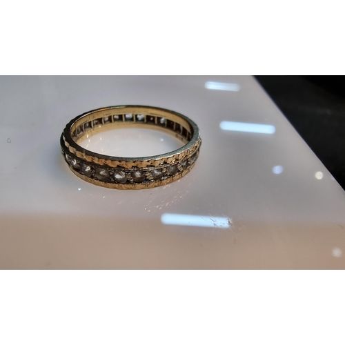 262 - 9ct. yellow Gold full eternity ring with genuine clear quartz stone all around. In good condition. S... 