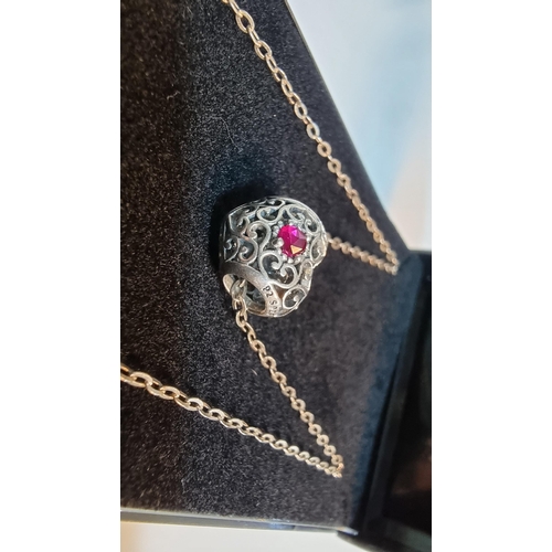 265 - Genuine Pandora heart pendant with a Ruby stone to the centre, set on 17