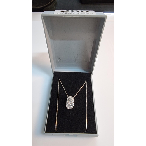 266 - 925 Silver pendant encrusted with CZ stones set on a 16