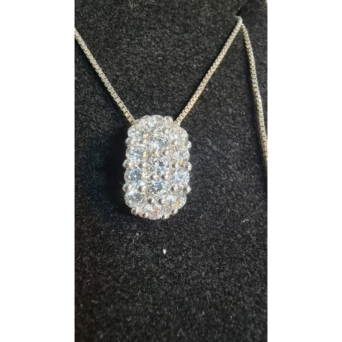 266 - 925 Silver pendant encrusted with CZ stones set on a 16