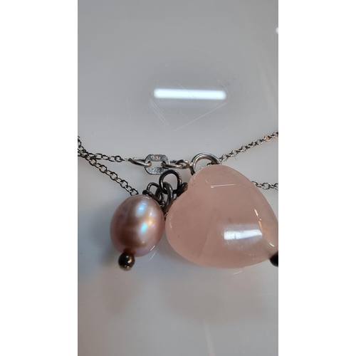 269 - Rose quartz & freshwater pearl pendant set on a 18