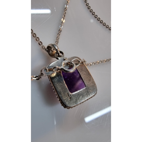 270 - 925 silver pendant inset with a large square amethyst gemstone. Set on a 16