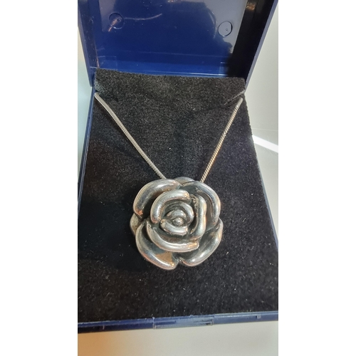 272 - Chunky 925 silver rose formed pendant set on an 18