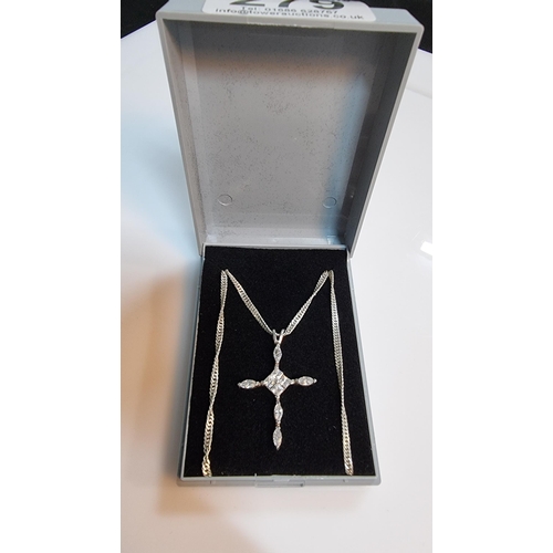 279 - 925 Silver crucifix pendant inset with quantity of CZ stones set on 18