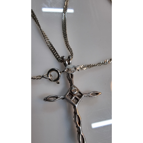 279 - 925 Silver crucifix pendant inset with quantity of CZ stones set on 18