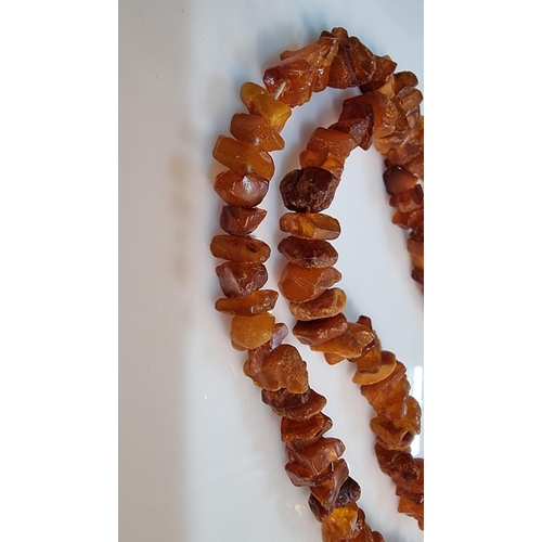 285 - Very long necklace with various amber beaded chips. in good clean condition. Total length of 100cm o... 