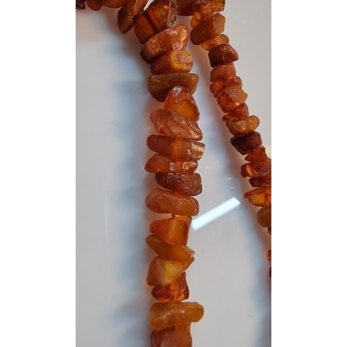 285 - Very long necklace with various amber beaded chips. in good clean condition. Total length of 100cm o... 