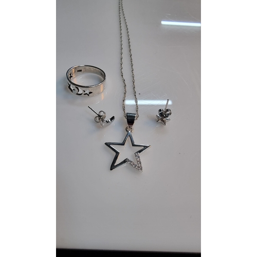 291 - Matching 925 Silver jewellery set inc. star pendant, moon & star earrings & a moon & star ring. All ... 