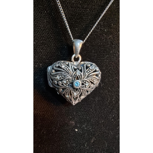 306 - Good quality ornate 925 Silver heart locket pendant with pierced design, with a aquamarine stone to ... 