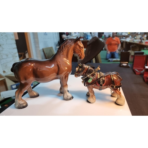 329 - Kelsboro Ware horse figure along with a small Melba ware shire horse figure. Largest horse measures ... 