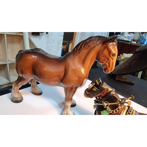 329 - Kelsboro Ware horse figure along with a small Melba ware shire horse figure. Largest horse measures ... 