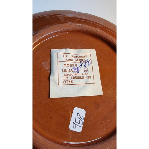 331 - Studio art glazed terracotta plate with a paper Russian label to the base. In good clean condition. ... 