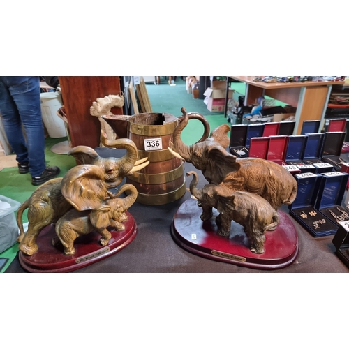 336 - Two large elephant & calf figurines in good condition along with a good antique brass bound copper j... 