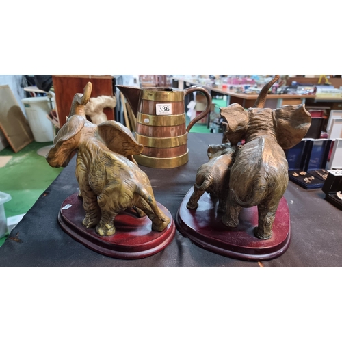 336 - Two large elephant & calf figurines in good condition along with a good antique brass bound copper j... 