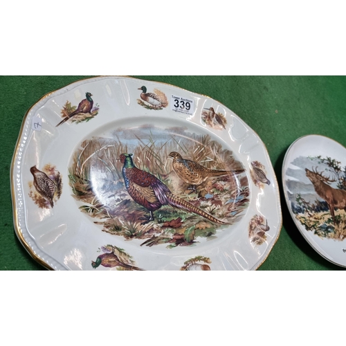 339 - 4x collectable hunting game scene plates, all in good condition. Largest measures 36cm x 28cm.