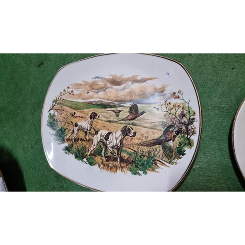 339 - 4x collectable hunting game scene plates, all in good condition. Largest measures 36cm x 28cm.