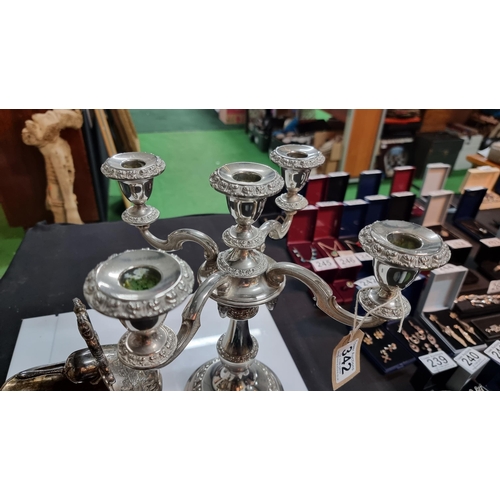 342 - Ornate silver plated candelabra and a silver plated sugar scuttle and original scoop. Candelabra mea... 