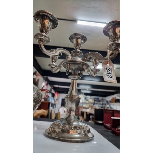 342 - Ornate silver plated candelabra and a silver plated sugar scuttle and original scoop. Candelabra mea... 