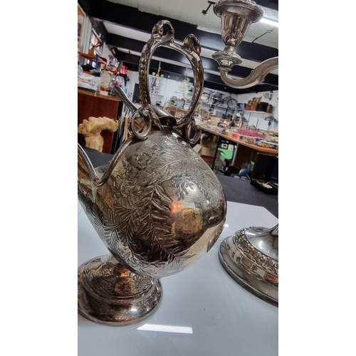 342 - Ornate silver plated candelabra and a silver plated sugar scuttle and original scoop. Candelabra mea... 