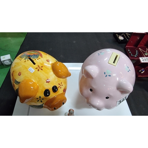 343 - Pair of large ceramic pig formed money banks with vintage Skeg Ness tourist ware ashtray. Largest pi... 