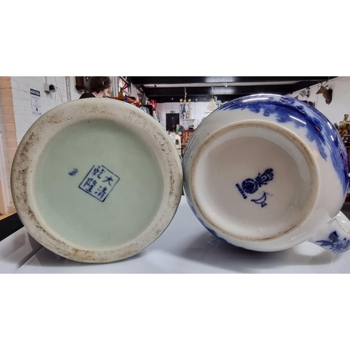 344 - Three pieces of blue & white china including a tall Chinese willow blue & white jug. Old Willow blue... 