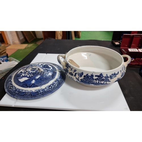 344 - Three pieces of blue & white china including a tall Chinese willow blue & white jug. Old Willow blue... 