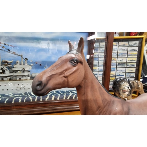 364 - Beswick racing horse (Red Rum) in a matte finish on a wooden plinth - in excellent condition with NO... 