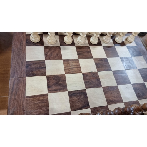 378 - Good large wooden chess board with large wooden carved chess pieces. Folds up for storage. In excell... 