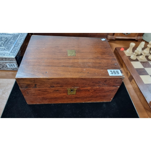 388 - Vintage Mahogany box containing a very large quantity of costume jewellery.