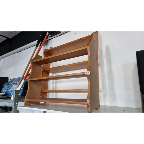 475 - 2x solid pine three shelf wall hanging bookcases. One bookcase measuring 61cm height, 76cm width the... 