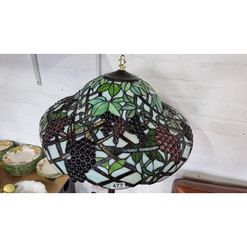 477 - Large impressive tiffany style standard lamp with a very large stained glass shade in grape & foliag... 