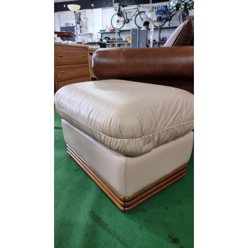 479 - Large full cream leather pillow top footstool. Bought over 5 years ago and has never once been used,... 