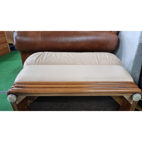 479 - Large full cream leather pillow top footstool. Bought over 5 years ago and has never once been used,... 