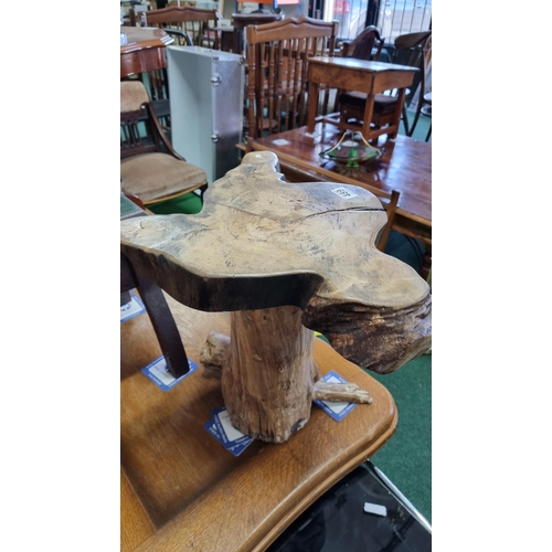 489 - Rustic side table made out from root wood in good condition. Measures 45cm height, 51cm width, 40.5c... 