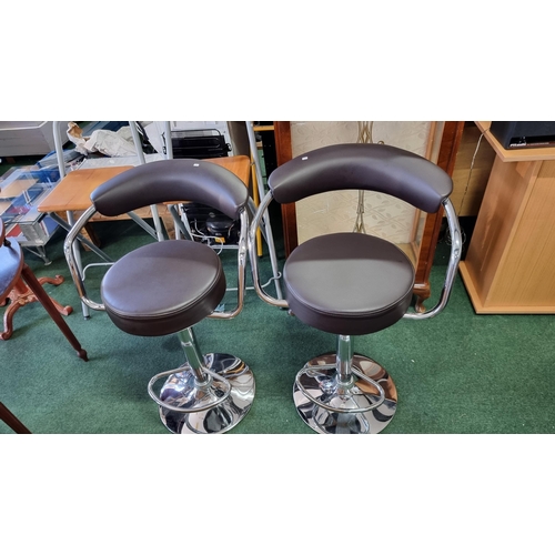 505 - Pair of leather look & chrome gas powered bar stools. Never been used came straight out of a house i... 