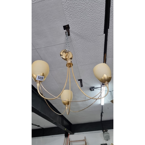 509 - Modern pretty brass three division ceiling light fitting with cream glass shades. In good clean cond... 