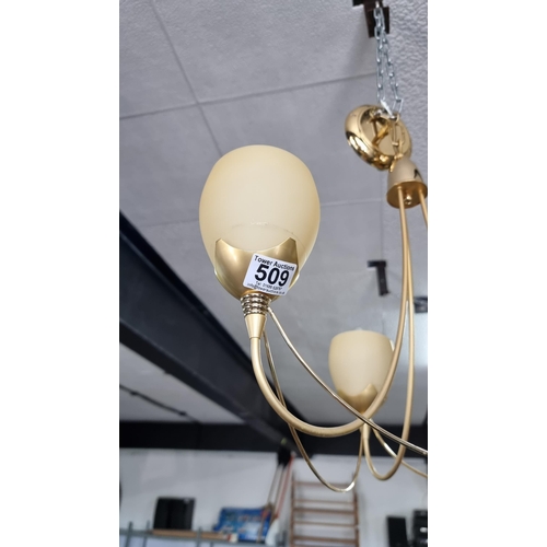 509 - Modern pretty brass three division ceiling light fitting with cream glass shades. In good clean cond... 