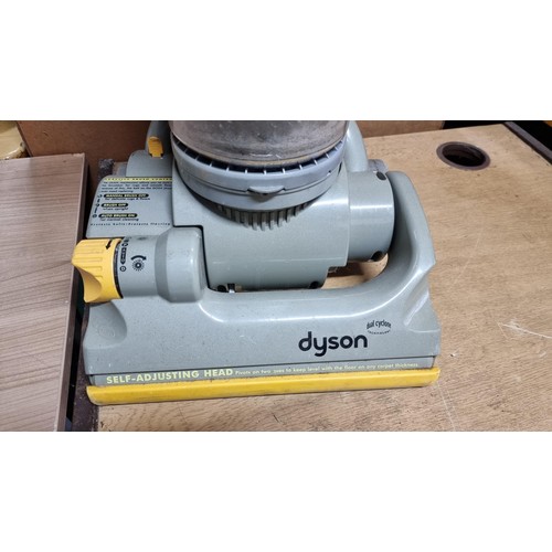 6 - Dyson DC04 vacuum cleaner in working condition complete with some accessories