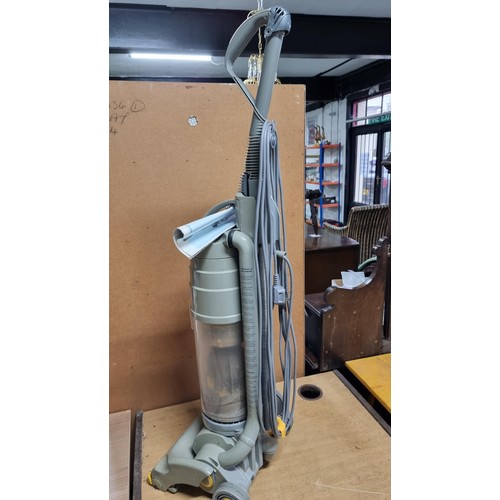 6 - Dyson DC04 vacuum cleaner in working condition complete with some accessories