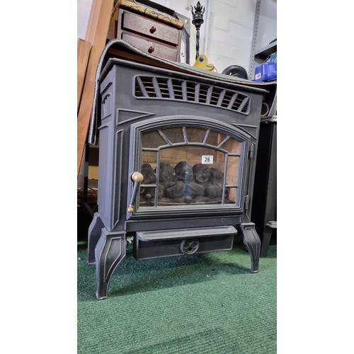 26 - Good quality metal gas powered heater in the form of a multi stove, in good condition, height of 63c... 