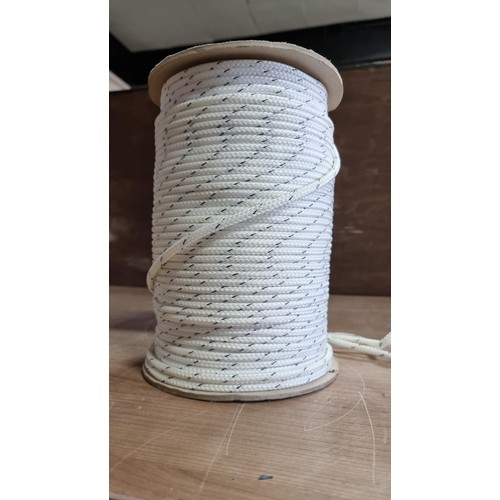 36 - Reel full of strong paracord handy for with many different uses