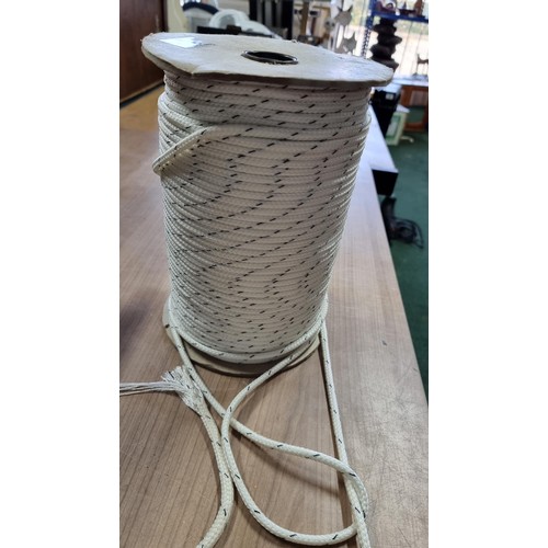 36 - Reel full of strong paracord handy for with many different uses