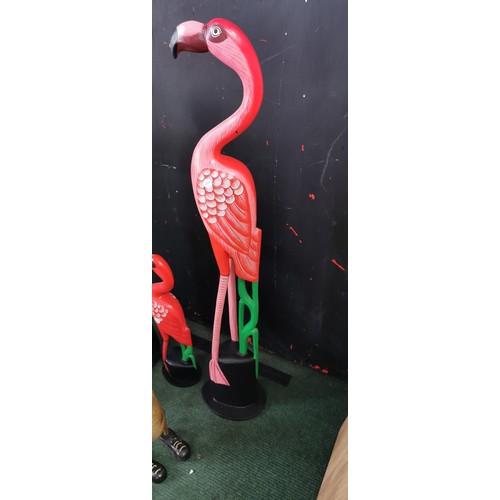 93 - 5x hand carved and hand painted tall wooden figures inc flamingos, parrot and 2x ducks. Tallest meas... 