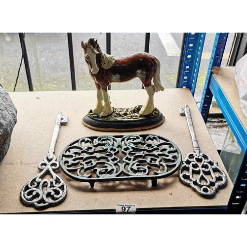 97 - Cast iron items inc horse formed door stop, vintage trivet etc